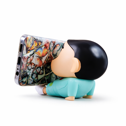 Side view of cute cartoon figurine mobile stand holding smartphone