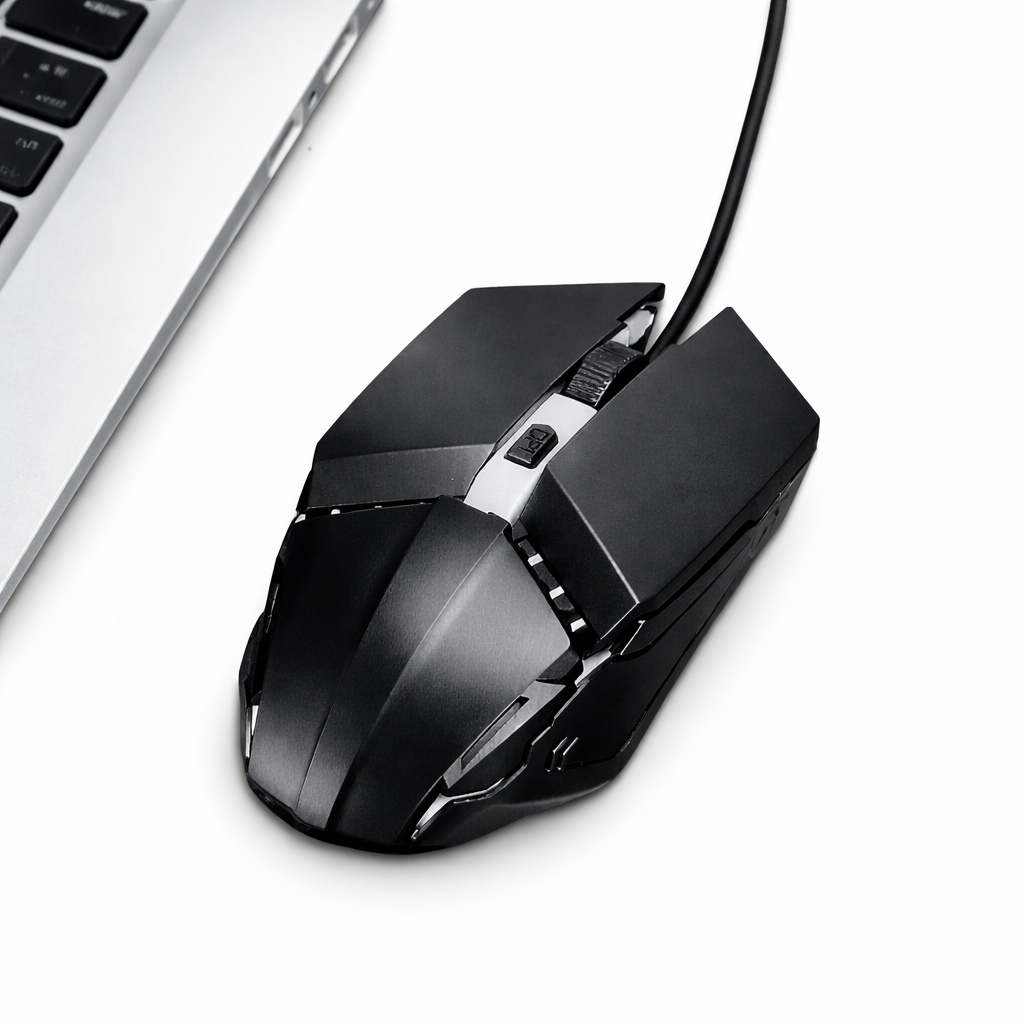 USB wired gaming mouse placed on desk setup with PC and laptop for gaming and office use