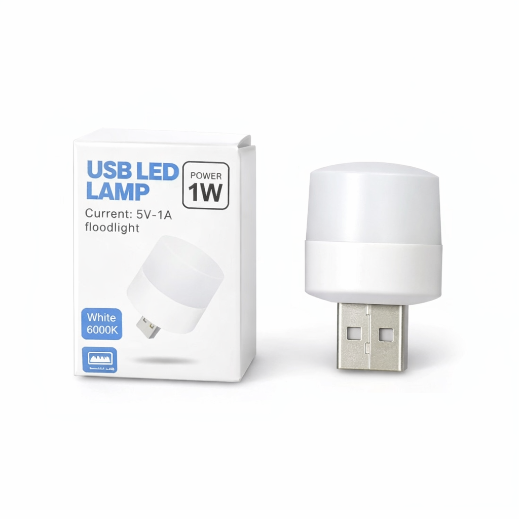 USB LED Night Light plugged into laptop USB port emitting soft white light